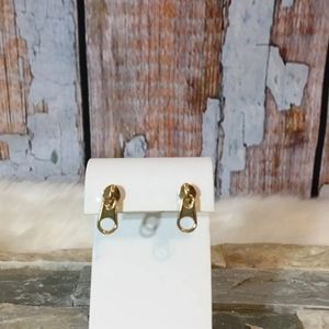 New gold tone zipper earrings.